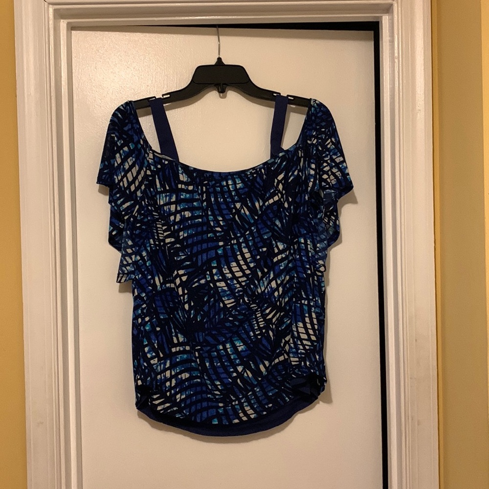 Cold shoulder blouse.